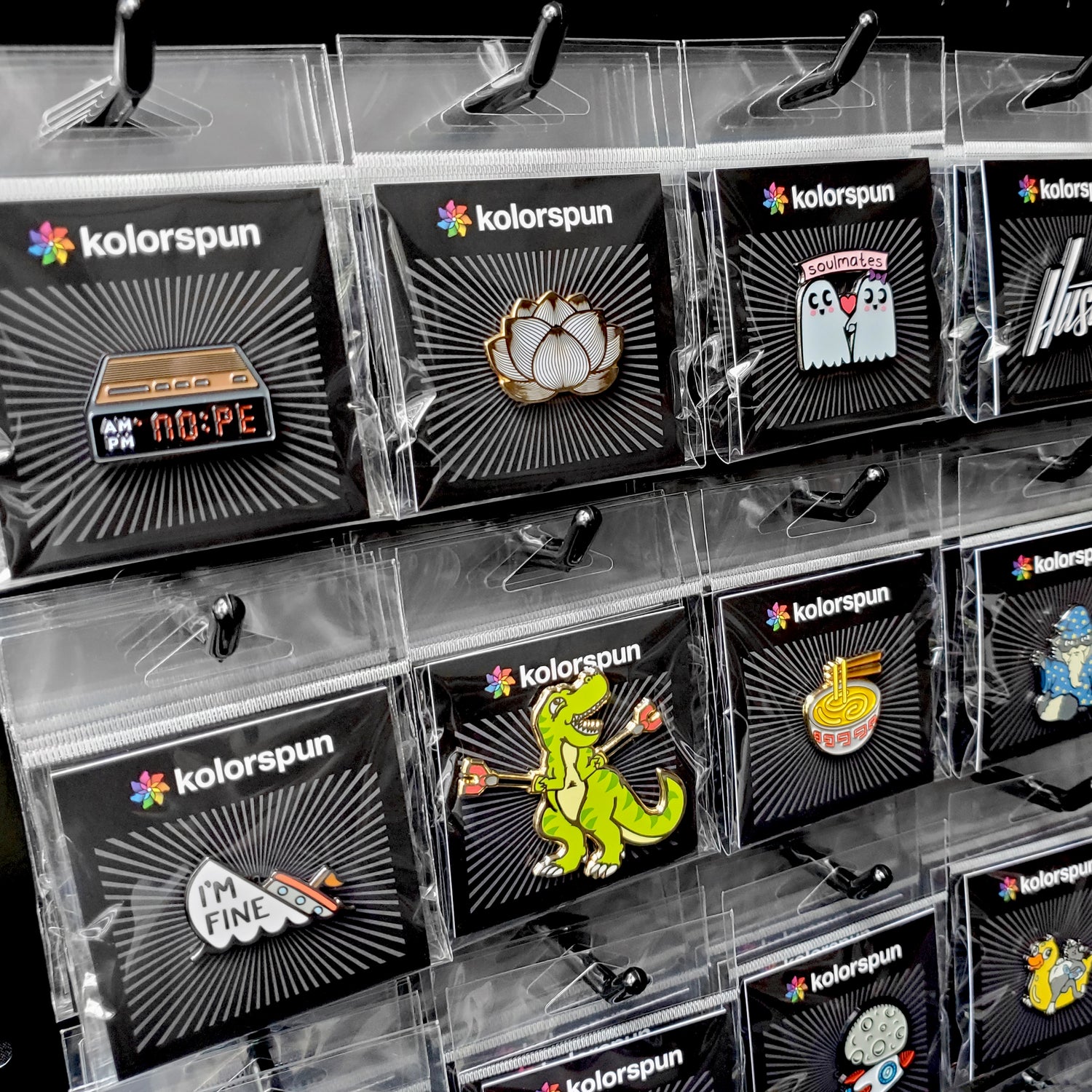 Kolorspun enamel pins on jacket